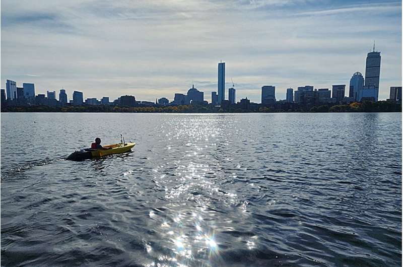 Northeastern University postdoctoral research associate Alan Papalia tested his algorithm by riding in an autonomous surface vehicle on the Charles River. Credit: Northeastern University Researchers develop algorithm that could make underwater robots more economical